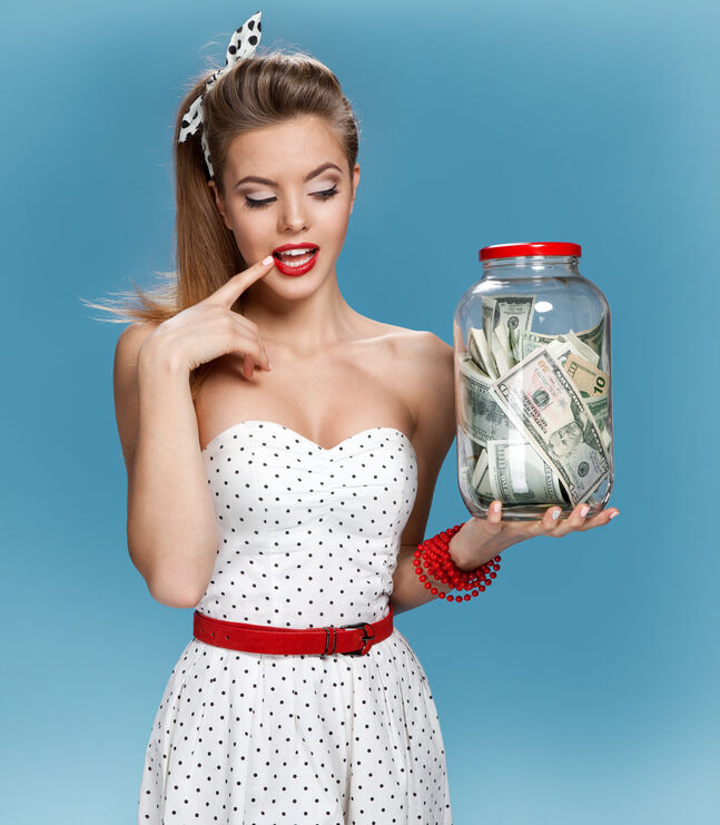 Retro woman with a jar of money having an idea on how to spend money on herself.